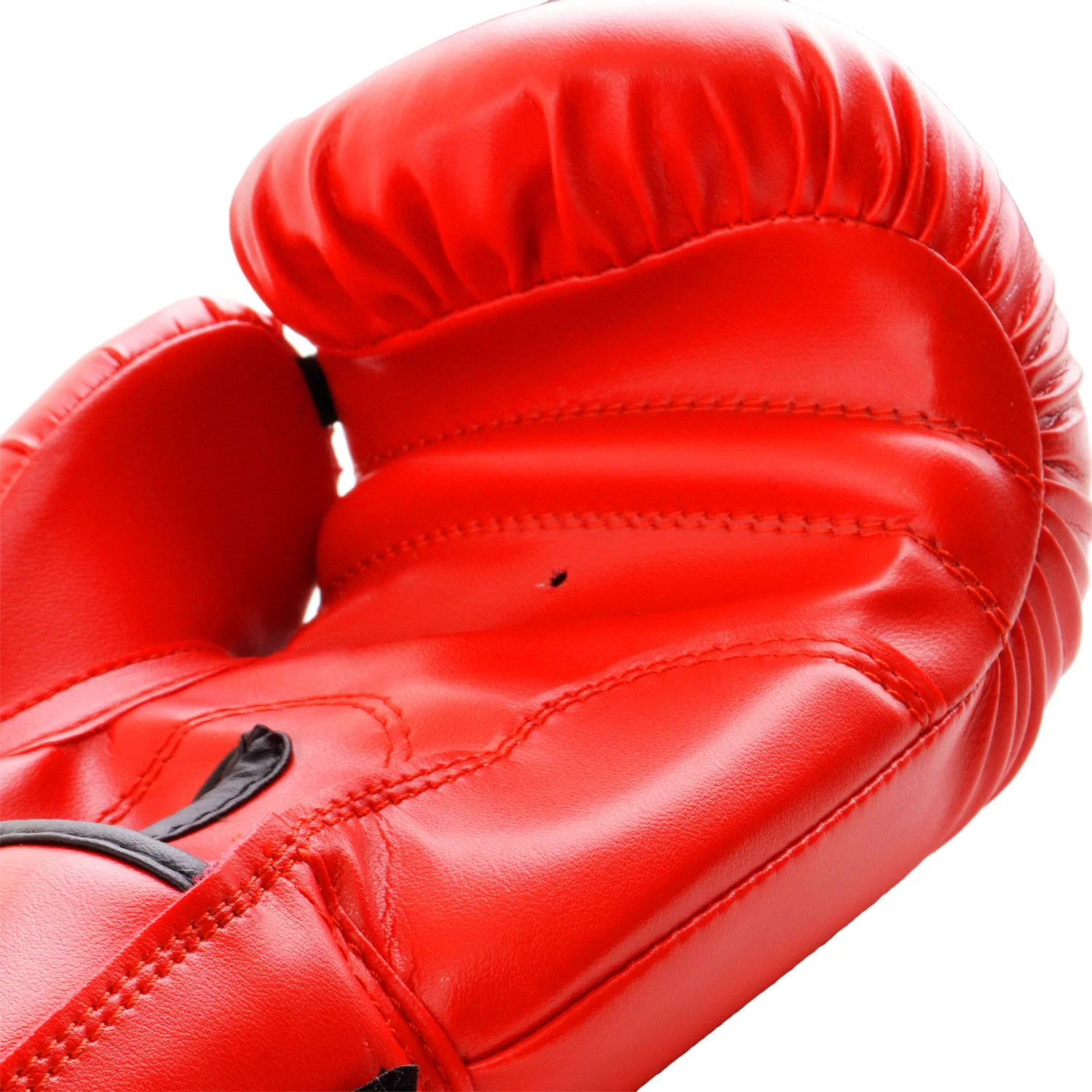 Реальное фото Перчатки боксерские Uppercot UBG-02 DX красный от магазина СпортСЕ